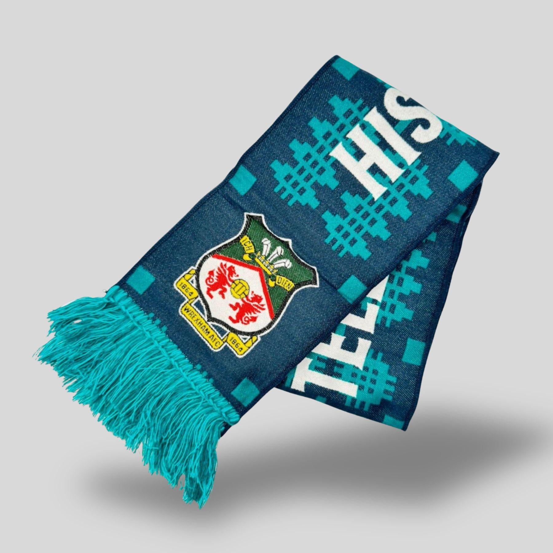 Blue and green scarf with a crest and text on a light gray background