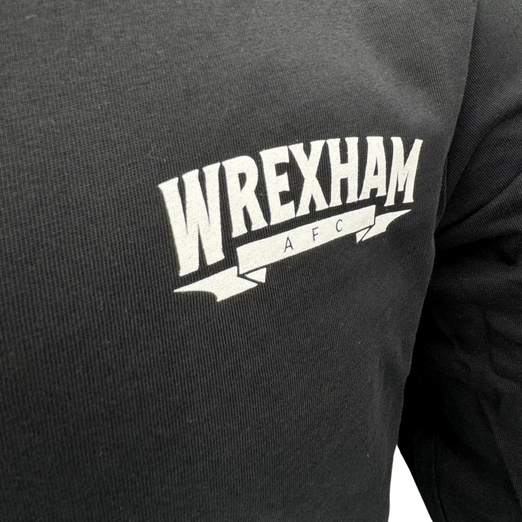 Black sweatshirt with 'Wrexham AFC' logo on a dark background
