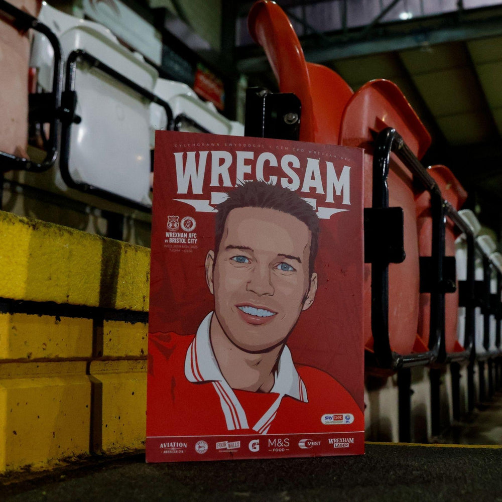 WRECSAM product packaging with a person's face on it, placed against a sports stadium background.