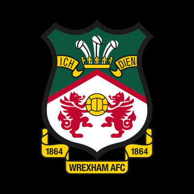 Wrexham AFC logo with green shield, red lions, and yellow text on a white background