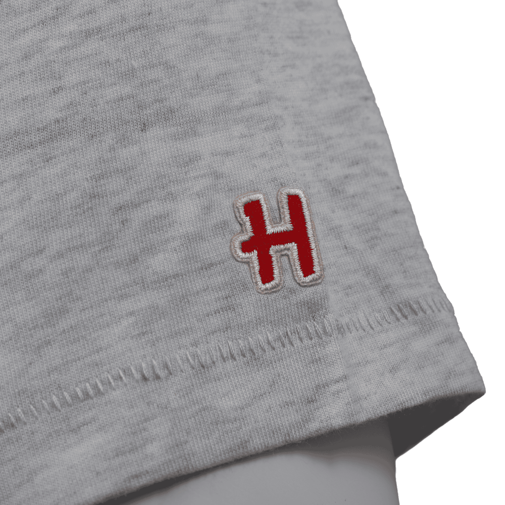 Gray fabric with a red and white logo on a white background