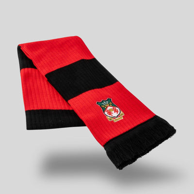 Red and black striped scarf with a crest on a light gray background